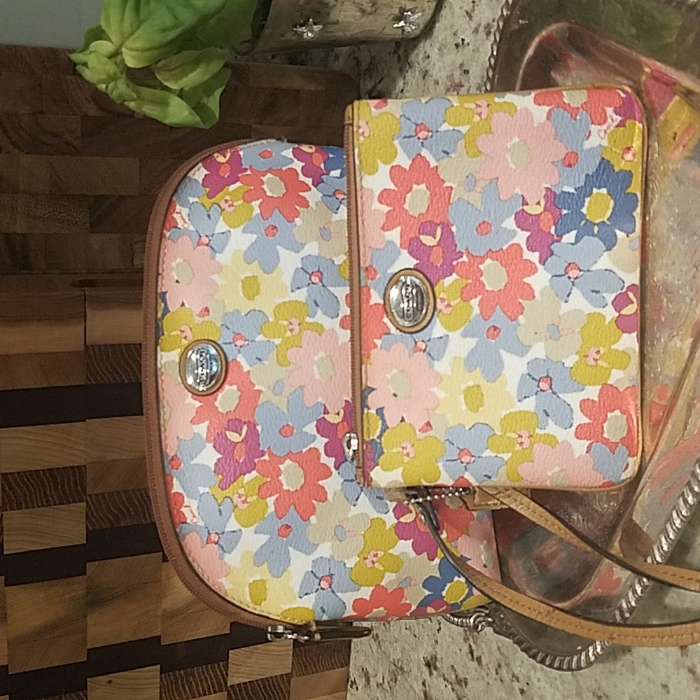 Coach, floral makeup bag and wristlet